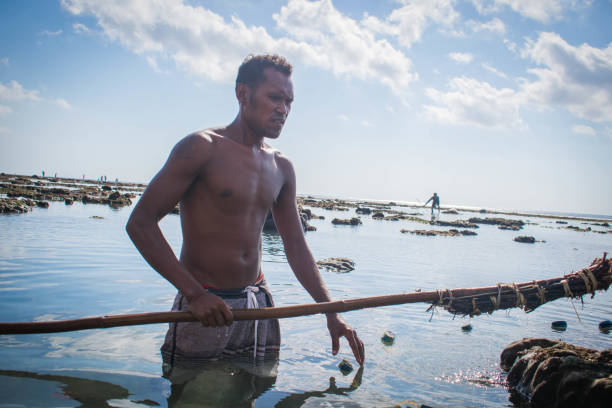 istock Balinese fisherman 1170325870