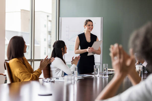 istock Business people applaud after presentation 1170329685