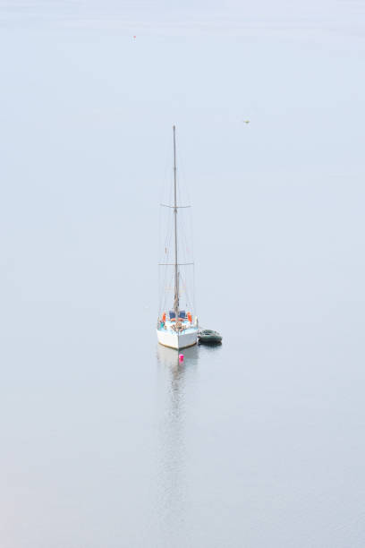 istock A sailing yacht stands on the water on a windless day 1170334181