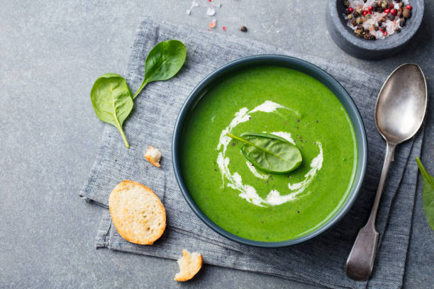 istock Spinach soup with cream in a bowl. Top view. Copy space. 1170344552