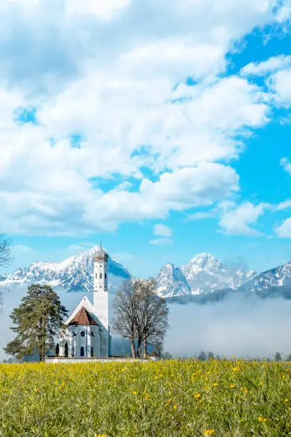 View of baroque church of saint-coloman, and is located in the village of Schwangau in southern Bavaria near the Austrian border. Germany