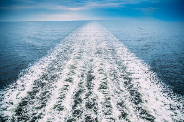 istock Sea. Water Ocean Waves Trails From Floating Ship Or Ferry Boat. Top View 1170348895