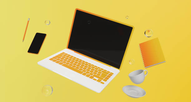 istock laptop with cellphone and coffee on yellow background. 3d render. 1170350517