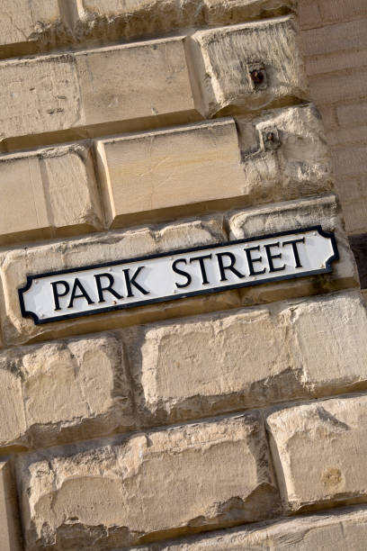 istock Park Street Sign on Wall 1170355658