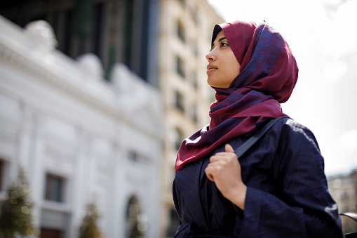 Young muslim woman travelling