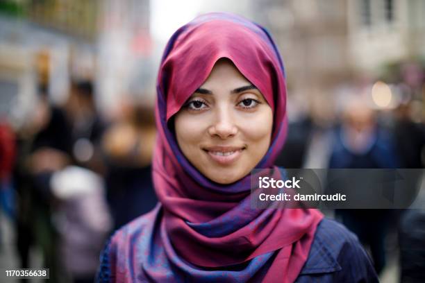Portrait Of Smiling Muslim Woman Outdoors Stock Photo - Download Image Now - Portrait, Women, Teenager