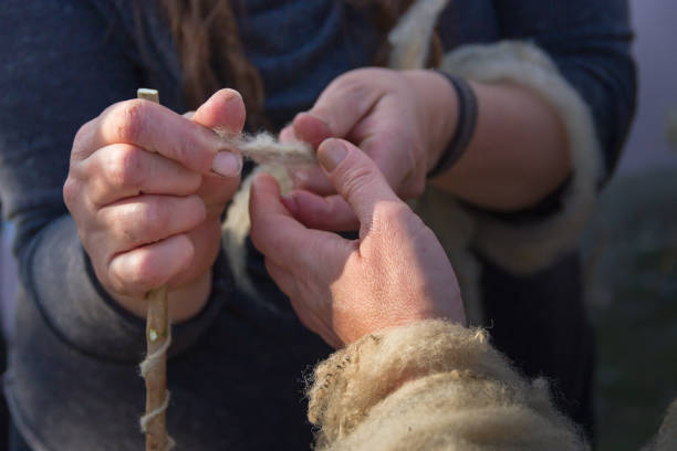 istock the hands that spin wool fleece by hand 1170357480