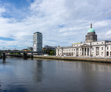 A view of the north quay of the River Liffey, Dublin, Ireland, with Liberty Hall in the background and the Customs House to the fore.
