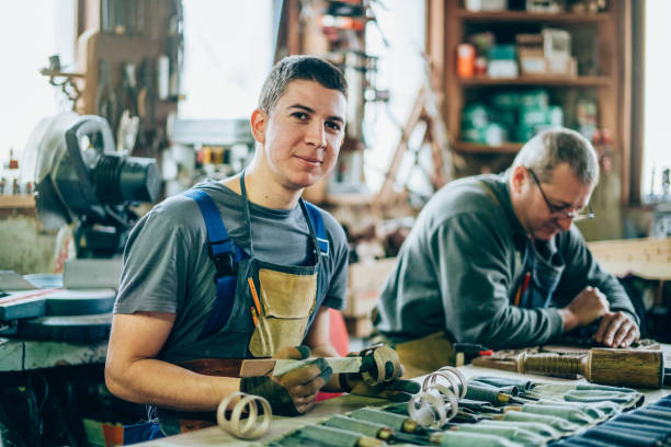 istock Father and son carpenters 1170359501