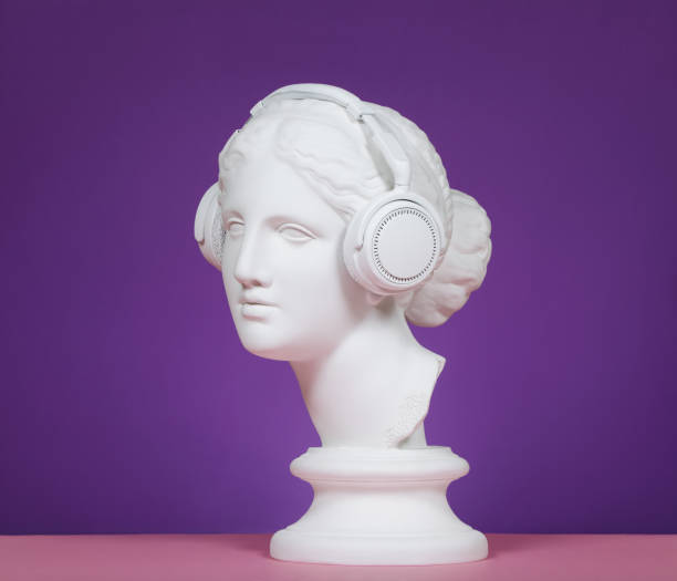 Modern Greek Goddess with headphones Plaster head model (mass produced replica of Head of Aphrodite of Knidos) with headphones conceptual realism photos stock pictures, royalty-free photos & images