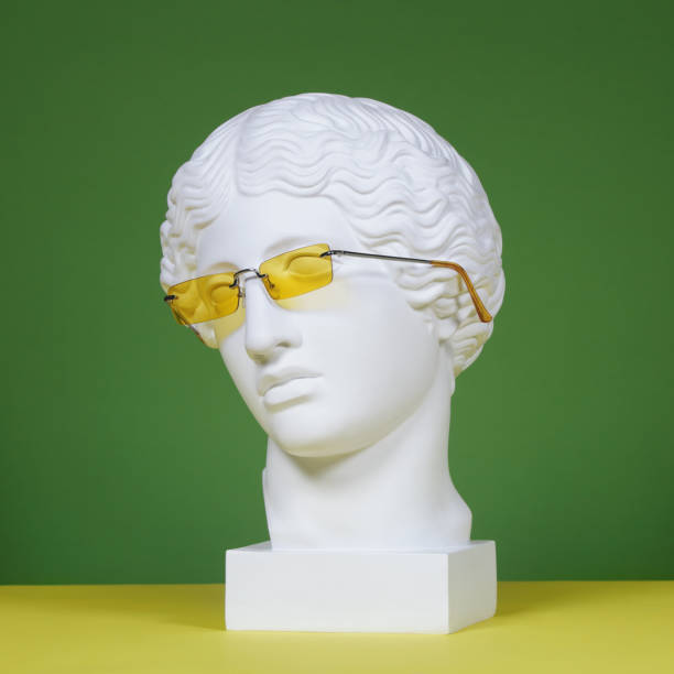 istock Plaster head with yellow tinted eyeglasses 1170360506