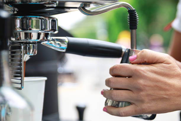 istock Barista is preparing coffee with milk 1170360792