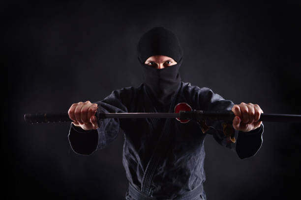 istock Powerful ninja portrait with katana 1170361895