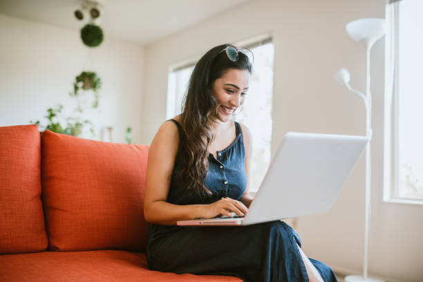 istock Woman Working Online On Laptop At Home 1170362030