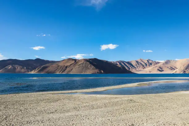 Pangong lake,ladakh,india.
Different shades of pangong lake in the Himalayas situated at a height of 4,350 m and It is 134 km long.