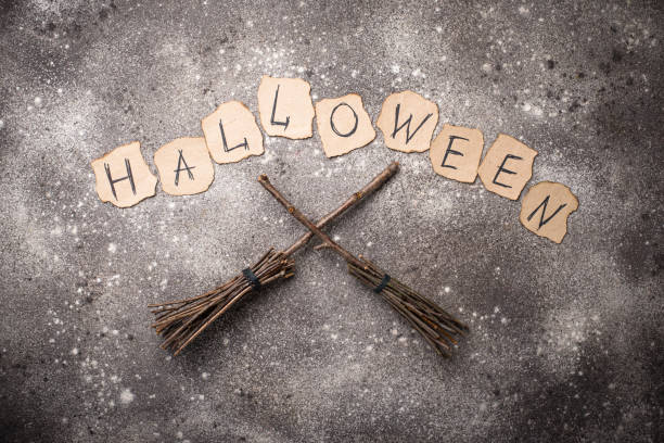 Halloween festive creative background with witches broom