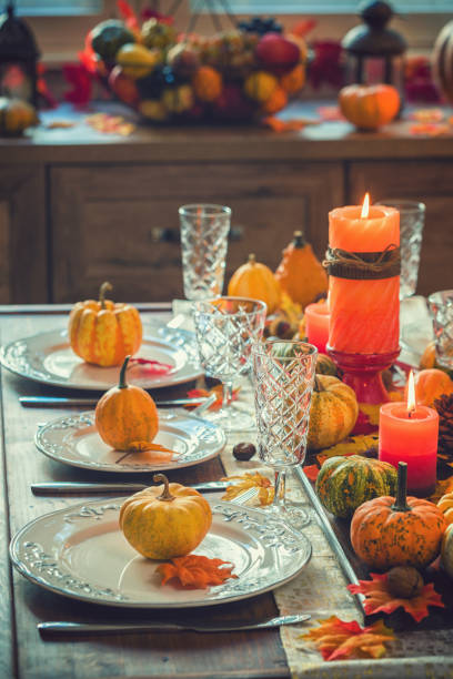 istock Thanksgiving Dining Table Place Setting with Autumn Decoration 1170369604