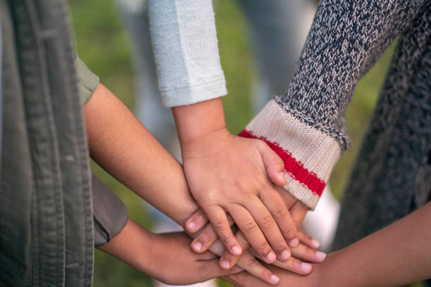 istock A group of children's hands 1170370956