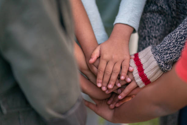 istock A group of children's hands 1170370990