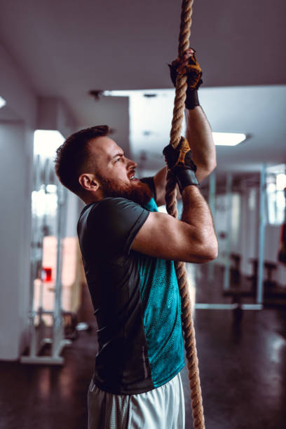 istock Rope Climbing Exercise By Young Male Athlete 1170373147