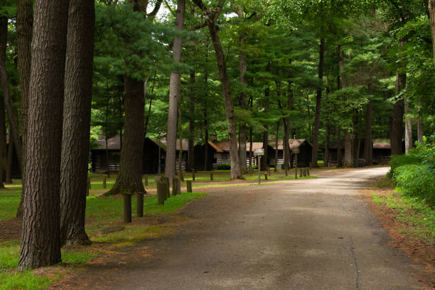 Log cabins in the forest.  White Pines Forest State Park, Illinois, USA