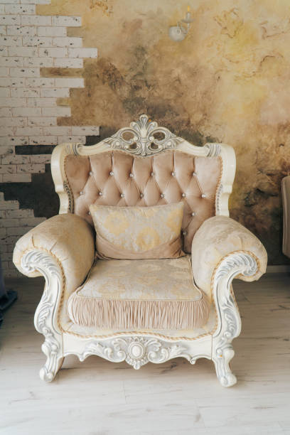istock beautiful expensive beige sofa against a white wall in an empty room 1170376048