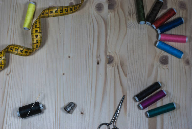 istock SEWING TOOLS ON WOOD BACKGROUND 6 1170376981