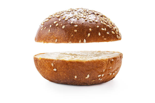 istock Homemade sourdough bread. Burger bun isolated on white background 1170377186