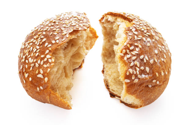 istock Homemade sourdough bread. Burger bun isolated on white background 1170377192