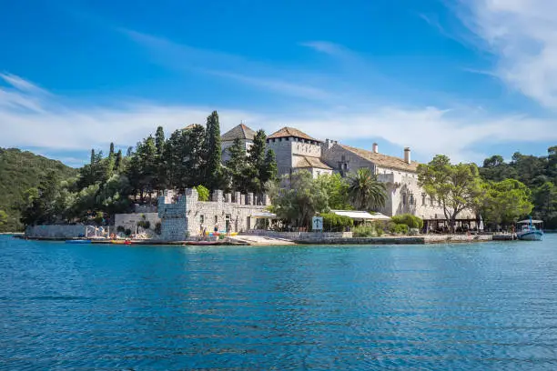 Benedictine monastery and church on St Mary's island, in the middle of Big Lake of Mljet national park, Croatia.