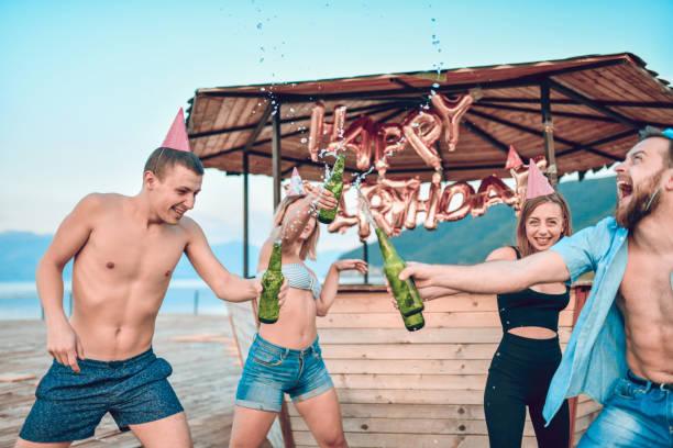istock Friends Having Fun Together At The Beach 1170383731