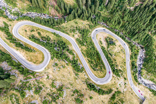 istock Winding mountain road, view from above. 1170384060