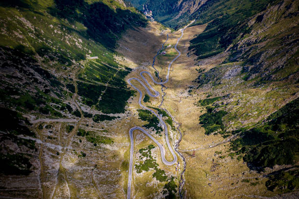 istock Road in the mountains. Steep turns. View from above 1170384081