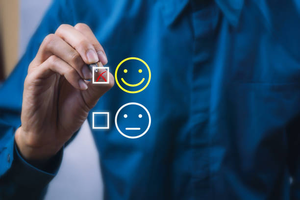 istock Conceptual the customer responded to the survey. The client using digital pen checkbox on happy face smile icon. Depicts that customer is very satisfied. Service experience and satisfaction concept. 1170384979