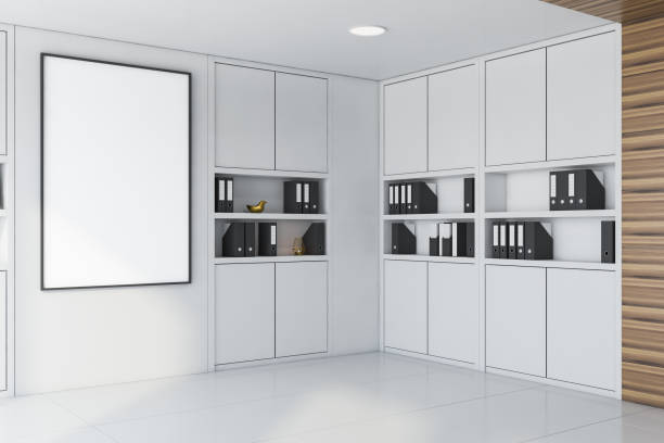 istock White and wood office with poster and bookcases 1170385995