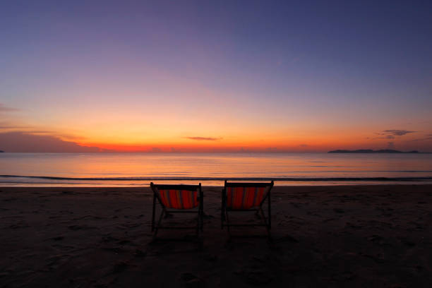 istock sunbed on the beach with beautiful sky background 1170389985