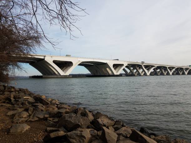 istock Wilson bridge and Potomac river with rocks and shore 1170390142