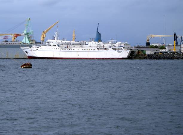 Malabo, Equatorial Guinea: Asaba 2, a Passenger/Ro-Ro Cargo Ship built in 1971 and currently sailing under the flag of the Comoros (reg. Moroni) - former Tiziano.