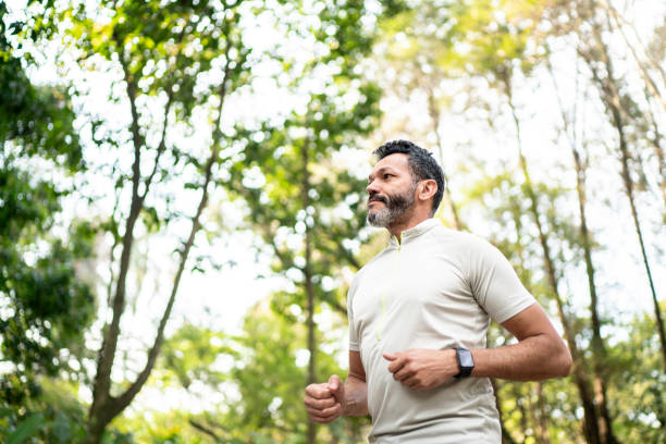 istock Man running in a park 1170397359