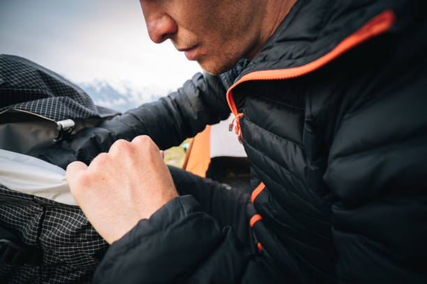 istock Detail of hiker organizing backpack 1170398518