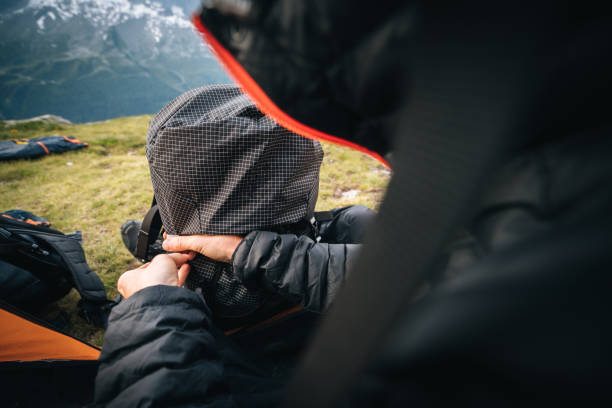 istock Detail of hiker organizing backpack 1170398521