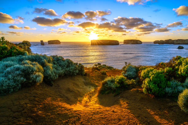sunset at bay of islands, great ocean road, victory, australia 45 panorama of sunset at bay of islands, great ocean road, victory, australia great ocean road photos stock pictures, royalty-free photos & images