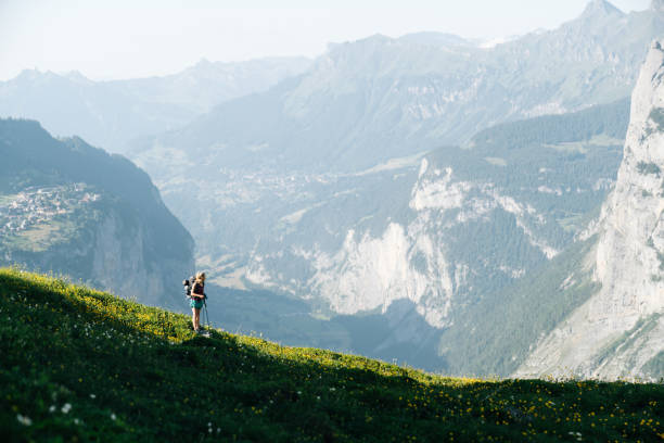 She looks off to distant scene, Mont Blanc