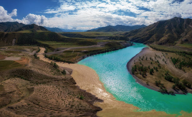The confluence of two rivers The confluence of two rivers, Katun and Chuya, the famous tourist spot in the Altai mountains, Siberia, Russia, aerial shot. altai mountains photos stock pictures, royalty-free photos & images