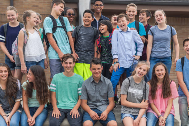 istock Portrait of elementary-age students outside the school 1170409697