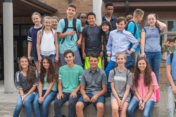 istock Portrait of elementary-age students outside the school 1170409702