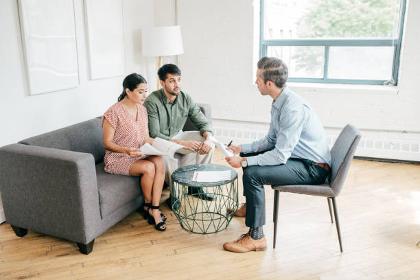 istock Real Estate Agent and clients 1170409976