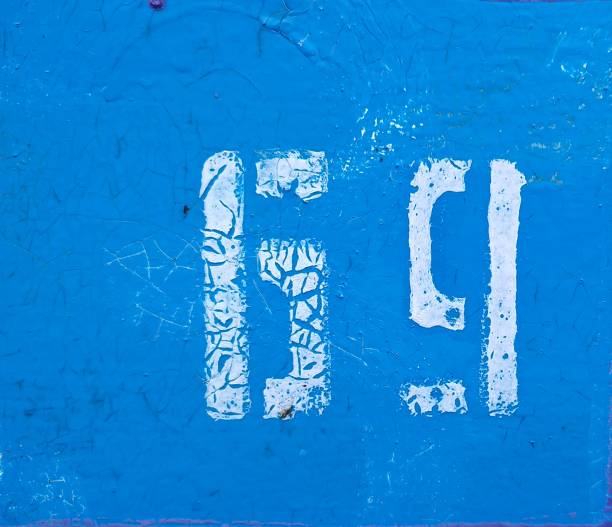 istock The number 69 with white paint on a cracked blue background. Close-up. 1170414025