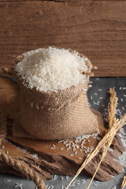 istock Thai white jasmine rice in sack bag in kitchen with a blank space for a text 1170414352