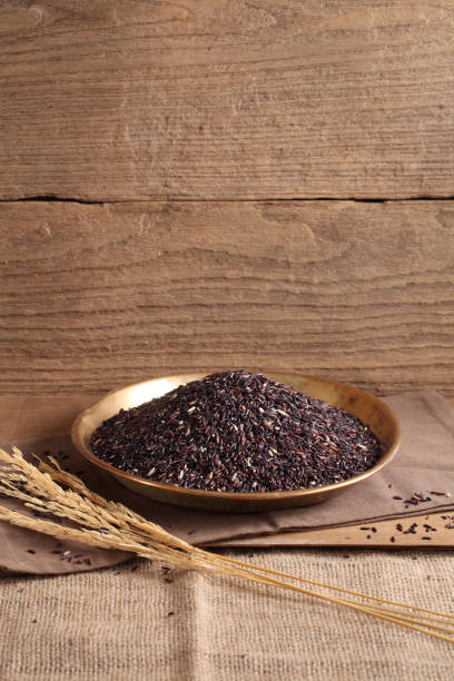 istock rice berry rice in golden tray on table with a blank space for a text 1170414387
